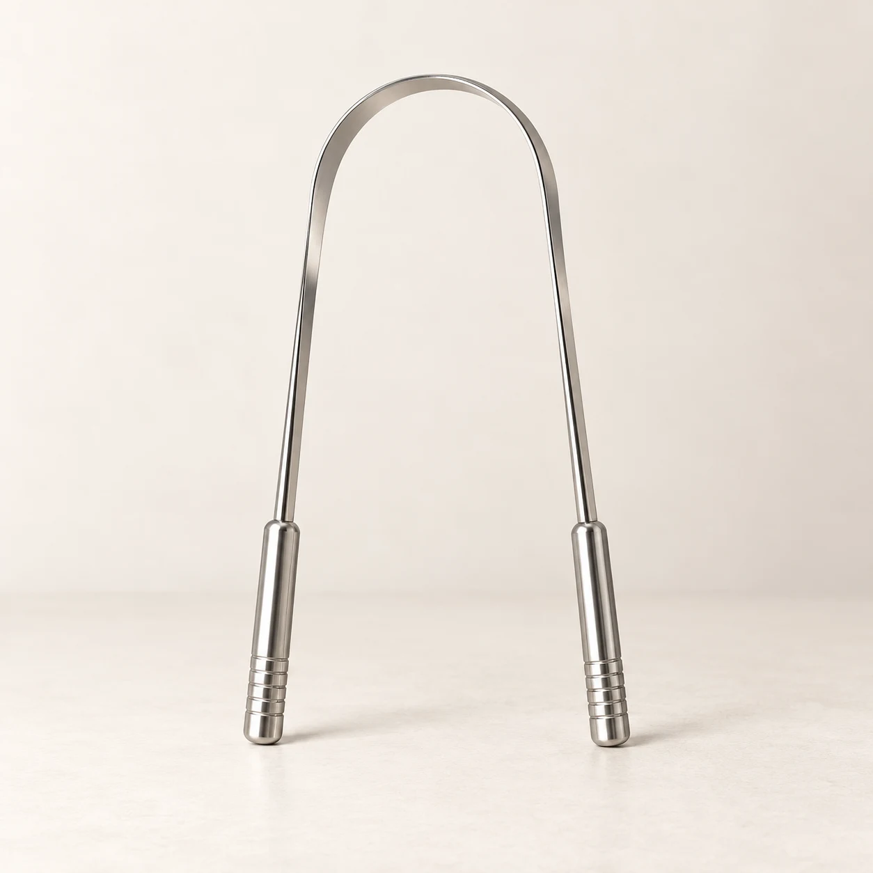 Rounded tongue cleaner